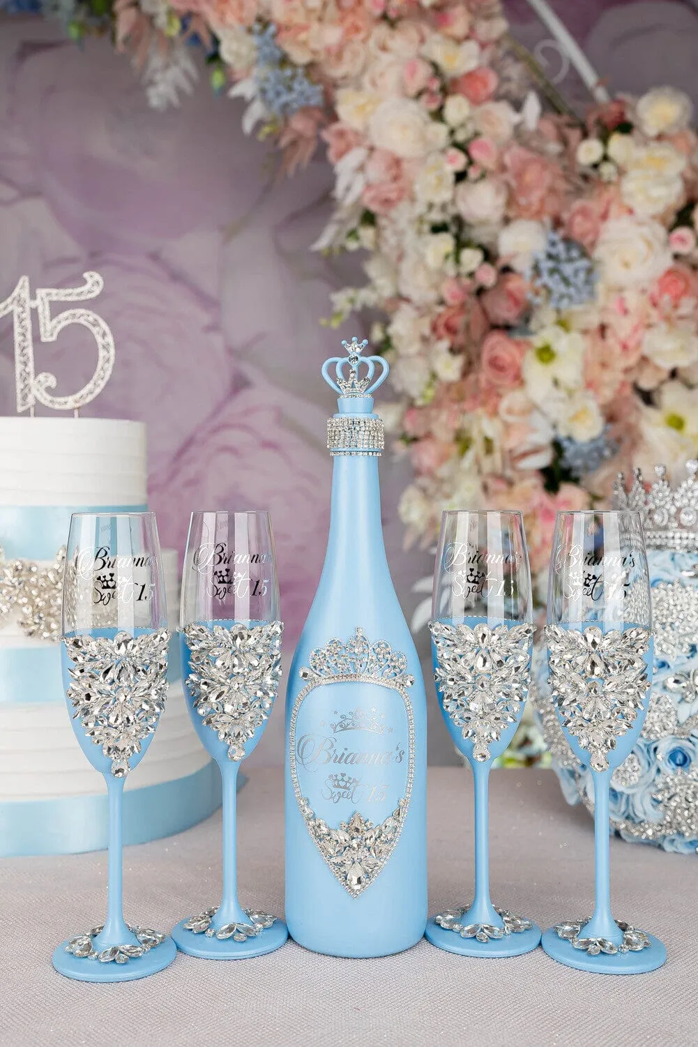 Light blue quinceanera bottle with 4 glasses